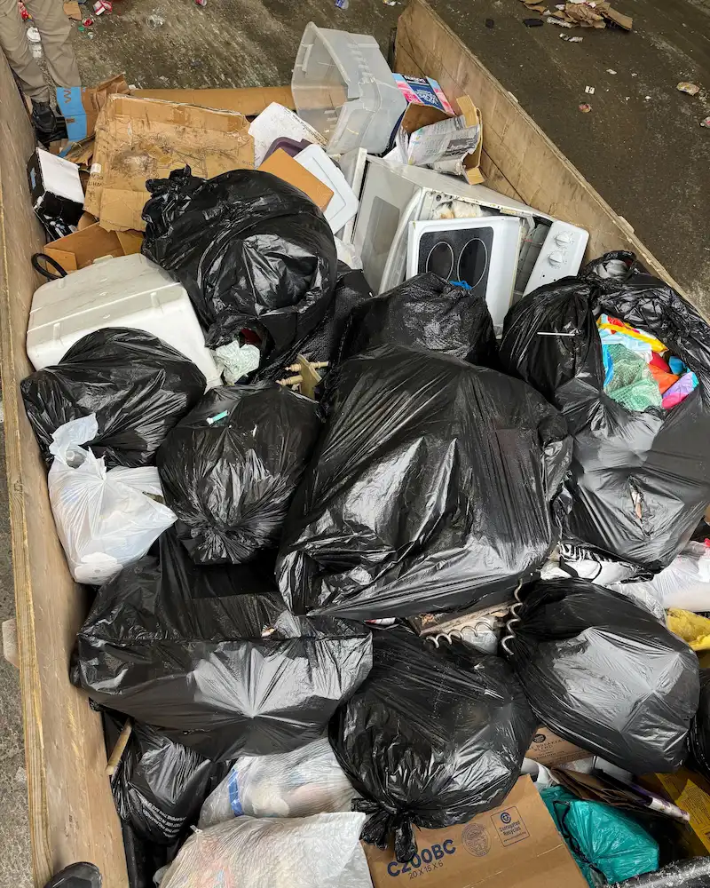 Bagged household trash and bulky waste collected during weekly trash pickup in Horseheads, NY